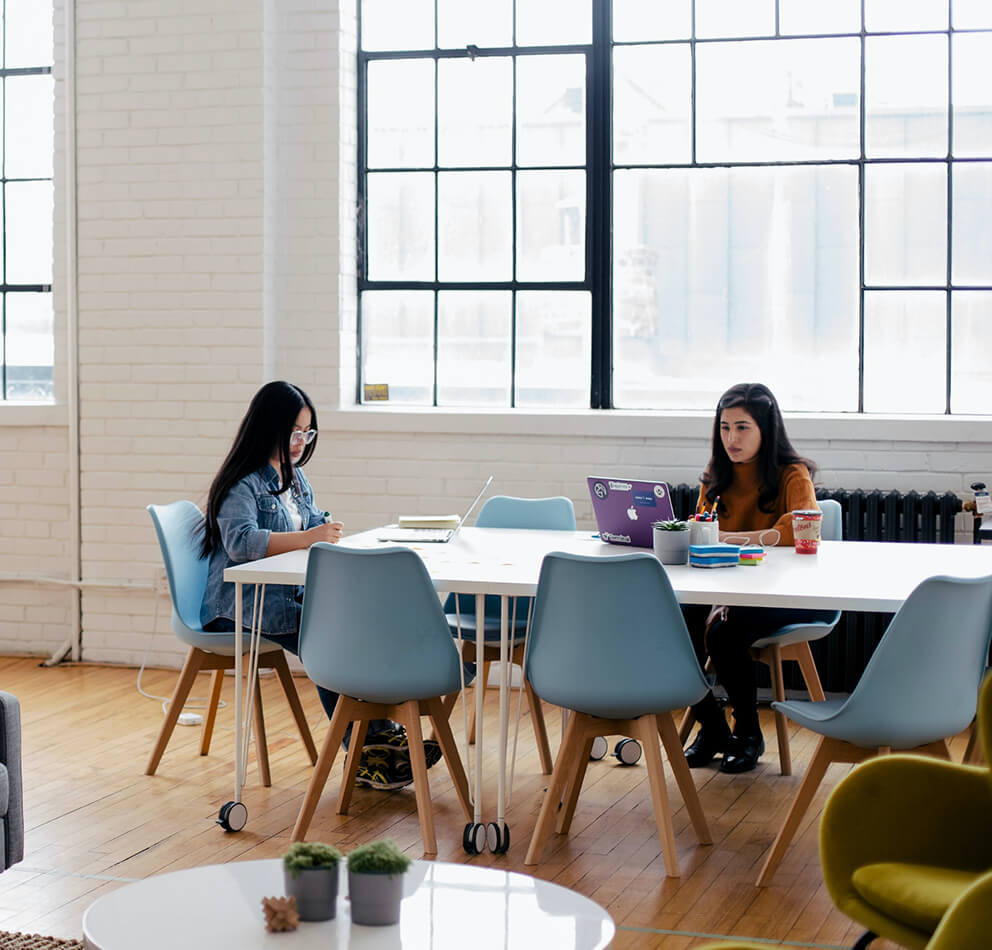 Women working on a desk